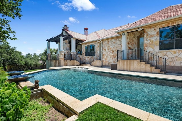 pool featuring a pergola