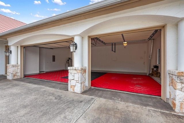 garage featuring driveway