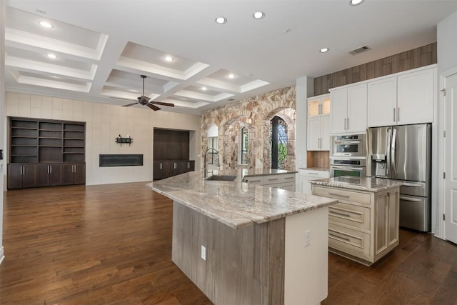 kitchen featuring a spacious island, visible vents, appliances with stainless steel finishes, coffered ceiling, and a ceiling fan