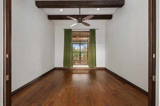 spare room with beam ceiling, a ceiling fan, baseboards, and hardwood / wood-style floors