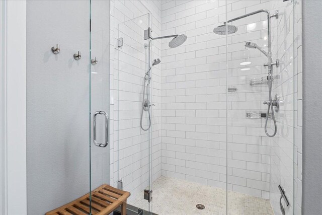 full bath featuring a stall shower