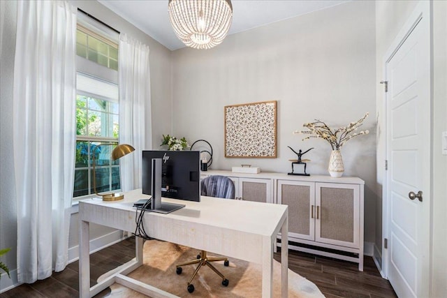 office area with a notable chandelier and wood finish floors