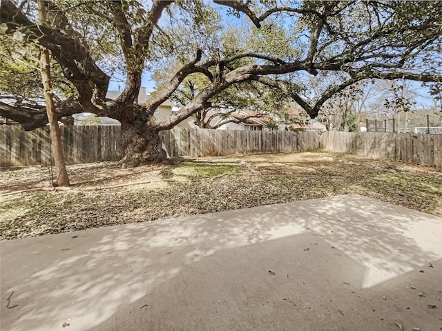 11510 Powder Mill Trl, Austin, TX 78750 - fenced backyard with a patio area