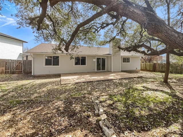 11510 Powder Mill Trl, Austin, TX 78750 - rear view of property with a fenced backyard and a patio