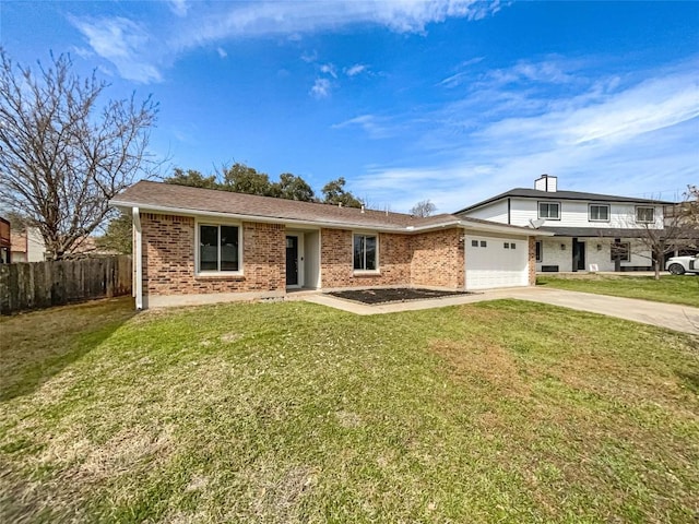 11510 Powder Mill Trl, Austin, TX 78750 - view of front facade featuring brick siding, concrete driveway, and an attached garage