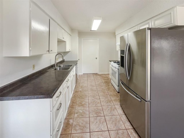 11510 Powder Mill Trl, Austin, TX 78750 - kitchen featuring stainless steel refrigerator with ice dispenser, a sink, white gas range oven, dark countertops, and white cabinets