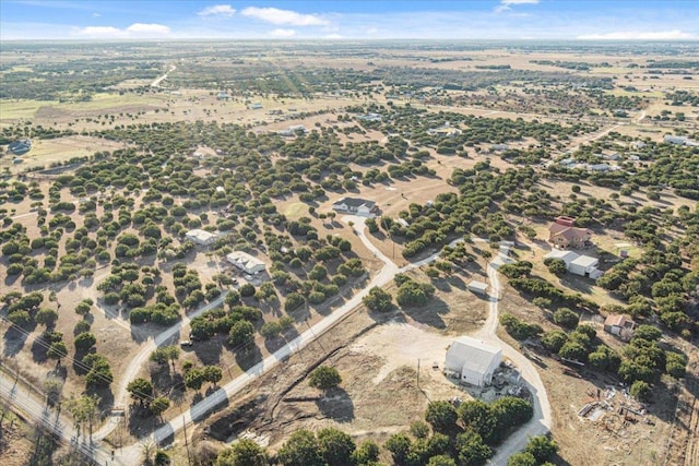 birds eye view of property featuring a rural view