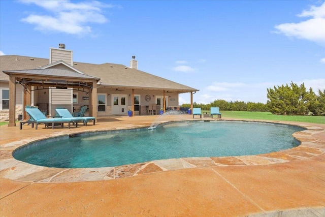 pool featuring a patio area