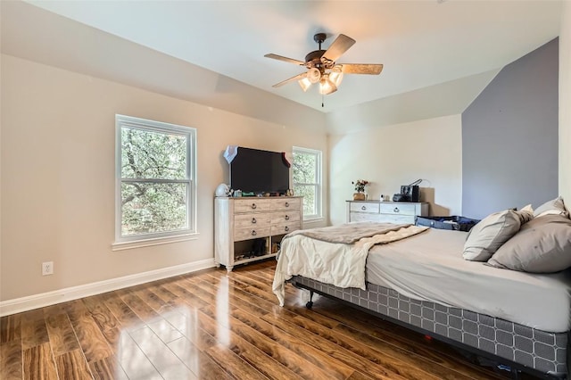 4514 Harvey Penick Dr, Round Rock, TX 78664 - bedroom with dark wood finished floors and ceiling fan