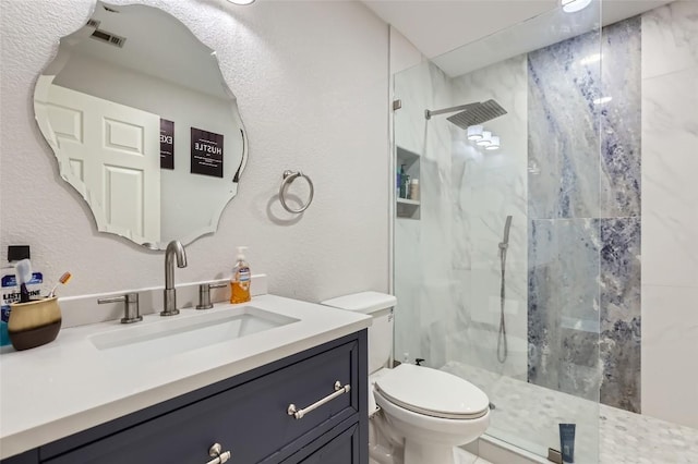 4514 Harvey Penick Dr, Round Rock, TX 78664 - bathroom featuring a marble finish shower and vanity