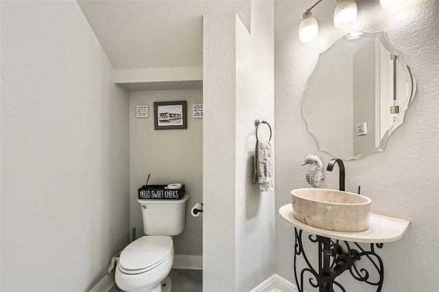 4514 Harvey Penick Dr, Round Rock, TX 78664 - half bathroom with a sink and toilet