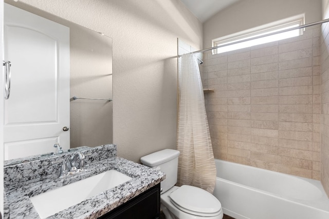397 Arapaho Dr, Kyle, TX 78640 - full bathroom with vanity, shower / bath combination with curtain, toilet, and a textured wall