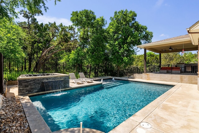 397 Arapaho Dr, Kyle, TX 78640 - view of pool featuring a fenced in pool, a fenced backyard, a patio area, a jacuzzi, and a ceiling fan