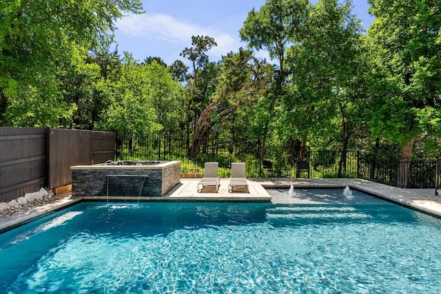 view of swimming pool featuring a patio area, a fenced backyard, and a fenced in pool