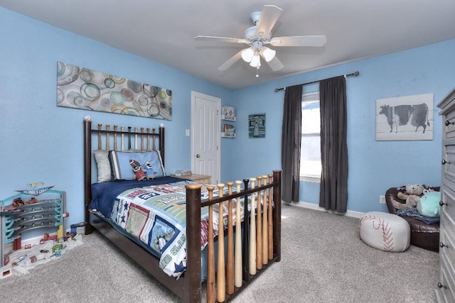 bedroom with baseboards, light colored carpet, and ceiling fan