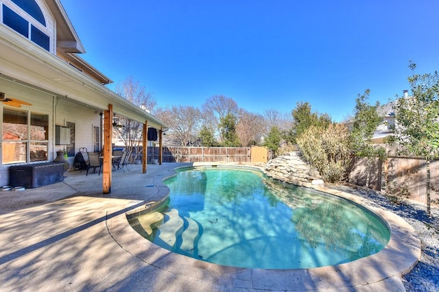 view of pool featuring a patio area, a fenced in pool, and a fenced backyard