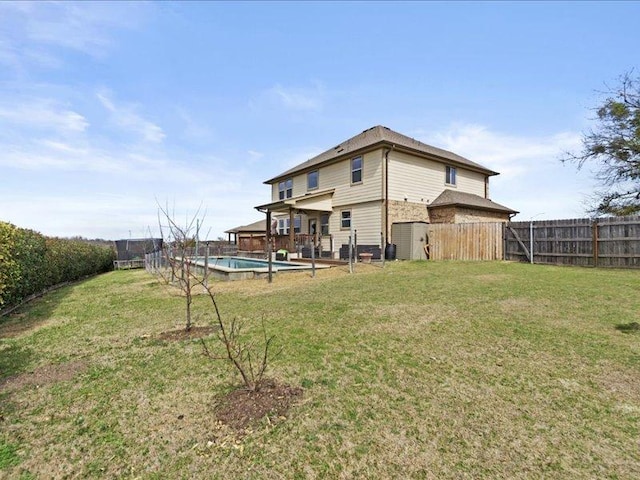 view of yard featuring a fenced backyard and a fenced in pool