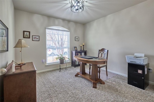 home office with baseboards and carpet floors