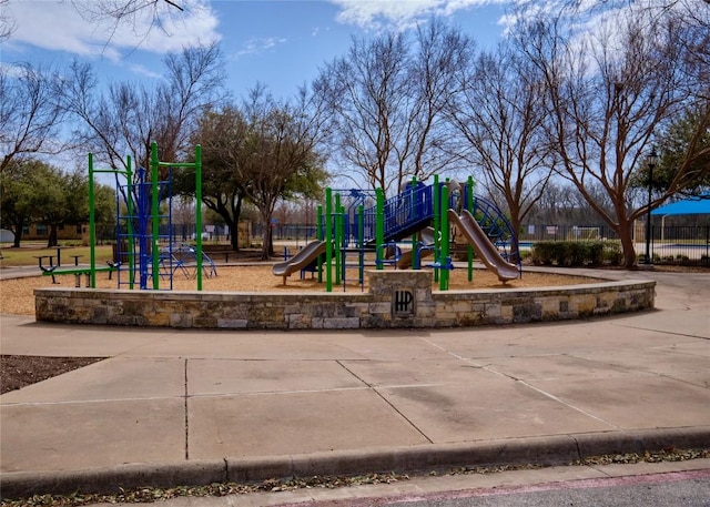 community play area featuring fence