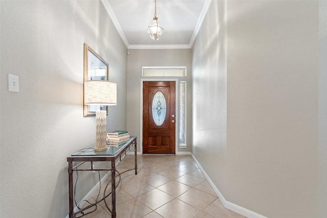 foyer entrance with light tile patterned floors, baseboards, a notable chandelier, and crown molding