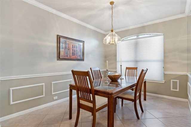 dining room featuring an inviting chandelier, light tile patterned flooring, and ornamental molding