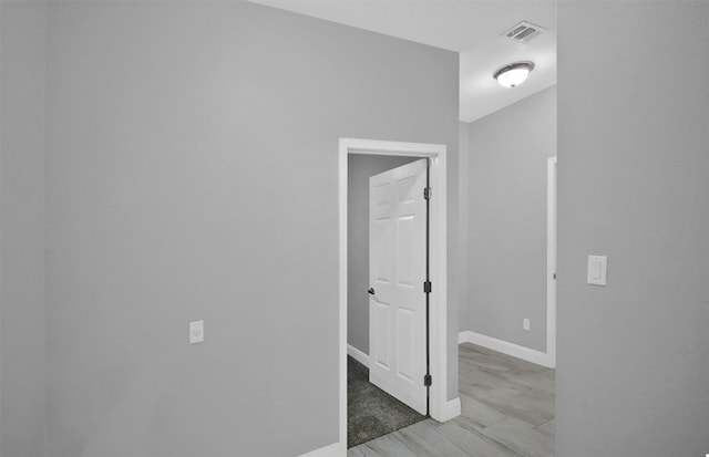 interior space featuring visible vents and baseboards