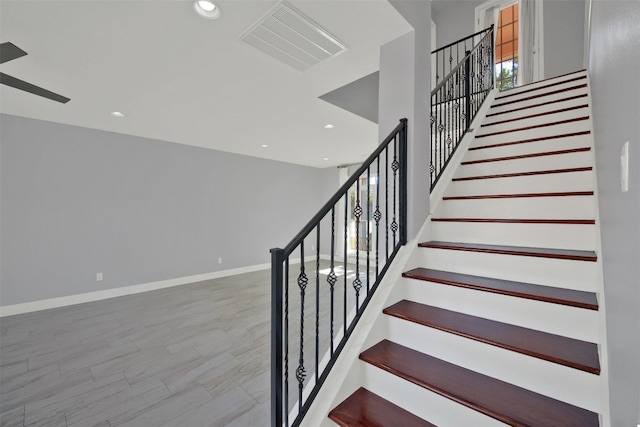 stairs featuring visible vents, recessed lighting, and baseboards