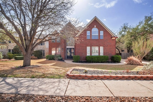 traditional home with brick siding