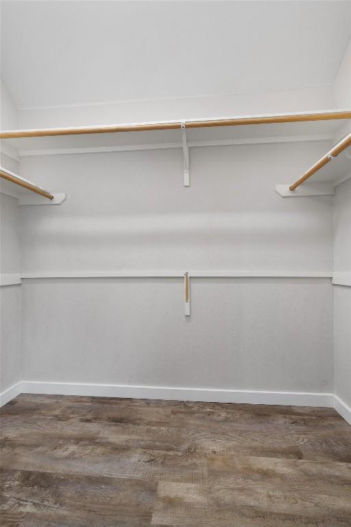 709 Stevenage Dr, Pflugerville, TX 78660 - spacious closet featuring wood finished floors