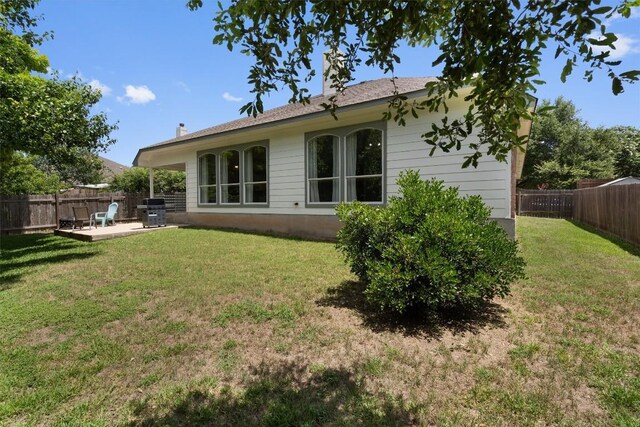 709 Stevenage Dr, Pflugerville, TX 78660 - rear view of house featuring a fenced backyard and a patio