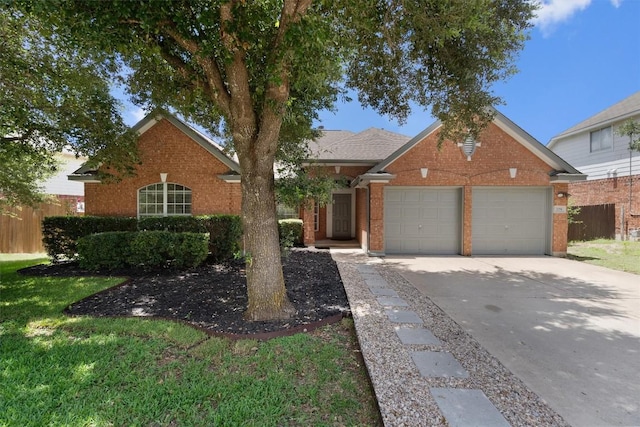 view of front of home featuring a front lawn, fence, concrete driveway, a garage, and brick siding