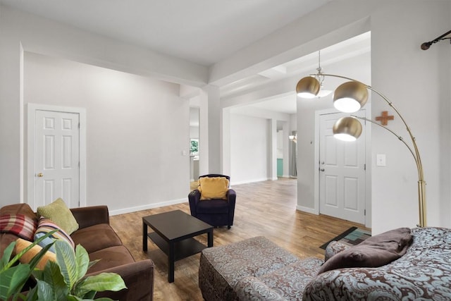 709 Stevenage Dr, Pflugerville, TX 78660 - living area featuring wood finished floors and baseboards