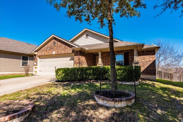 ranch-style home featuring brick siding, an attached garage, driveway, and a front lawn