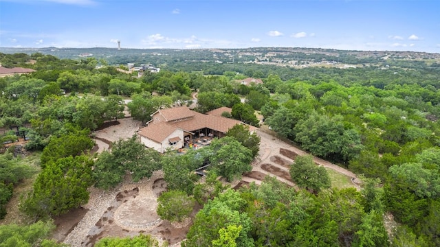 aerial view with a wooded view