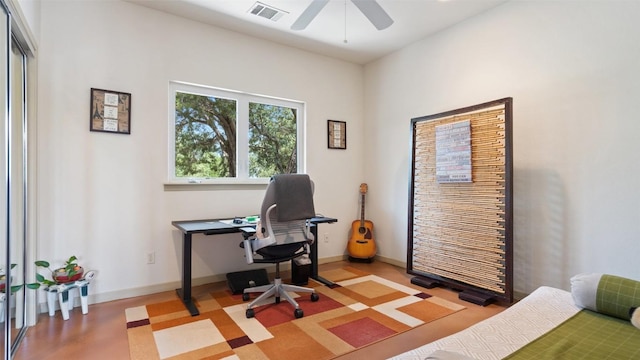 home office with visible vents, baseboards, and ceiling fan