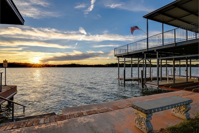 dock area with a water view