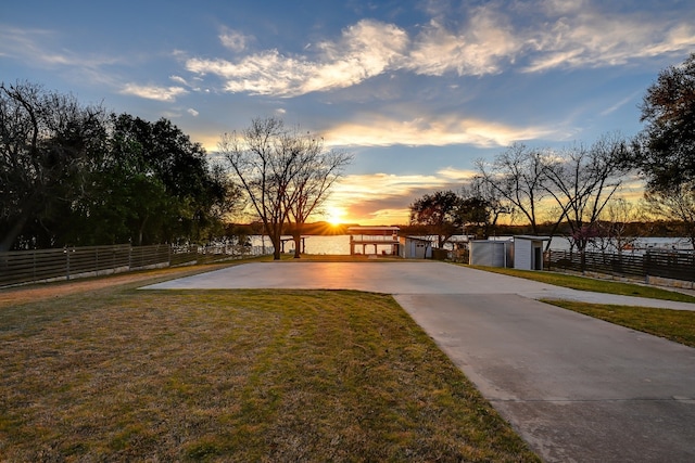 view of front of property with a front yard and fence