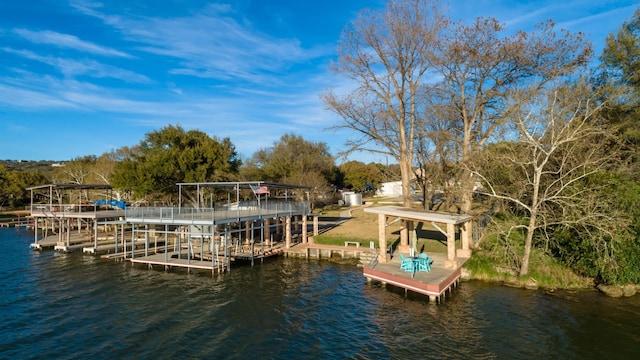 dock area featuring a water view and boat lift