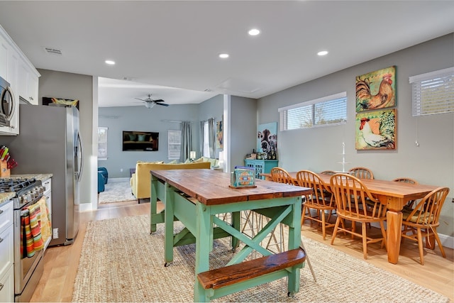 dining room with recessed lighting, visible vents, light wood-style floors, and ceiling fan