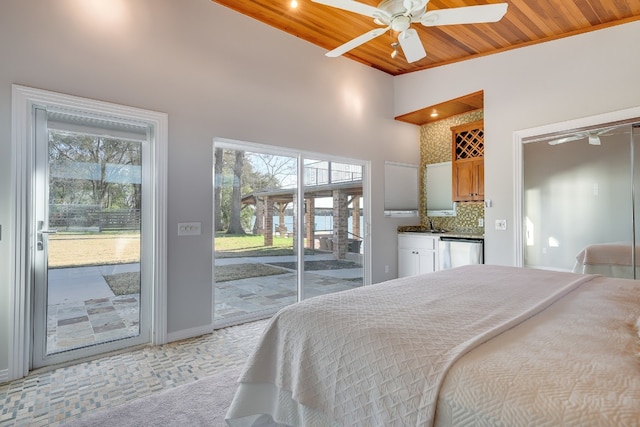 bedroom with high vaulted ceiling, access to outside, a sink, wooden ceiling, and indoor wet bar