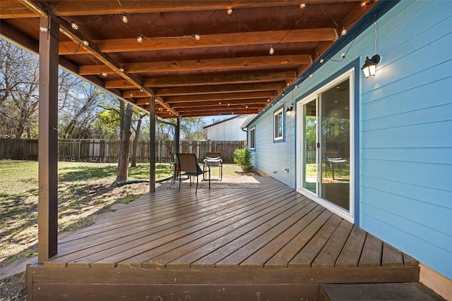 wooden deck featuring fence