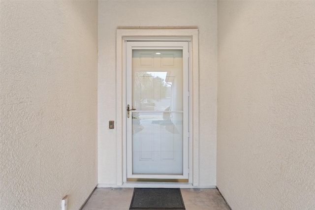 721 Texas Dr, Georgetown, TX 78633 - view of exterior entry with stucco siding