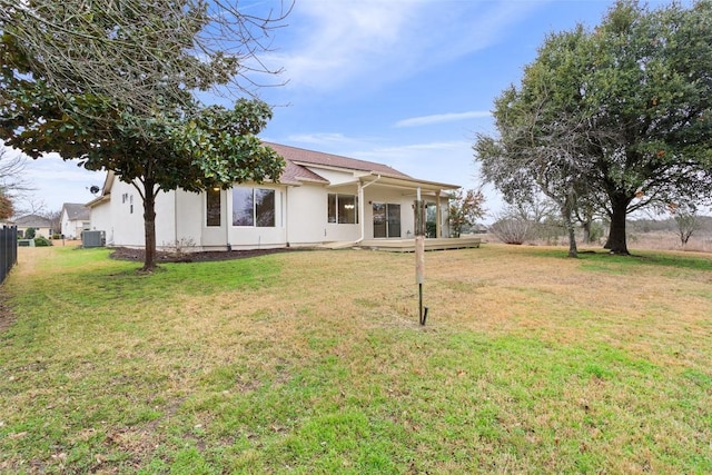721 Texas Dr, Georgetown, TX 78633 - back of house featuring stucco siding