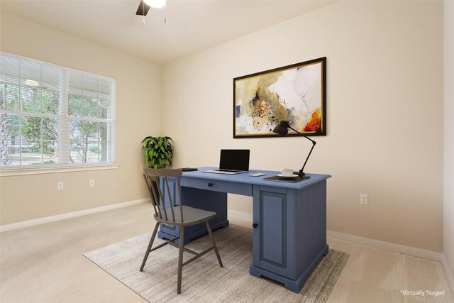 721 Texas Dr, Georgetown, TX 78633 - home office featuring light colored carpet, baseboards, and ceiling fan