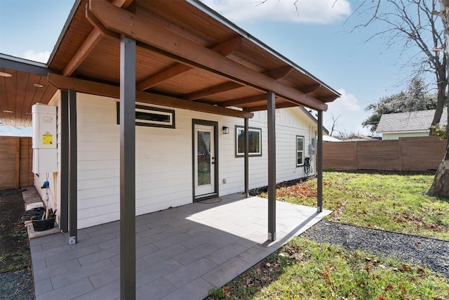 view of patio featuring fence