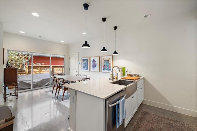 kitchen with baseboards, a sink, white cabinets, pendant lighting, and stainless steel dishwasher