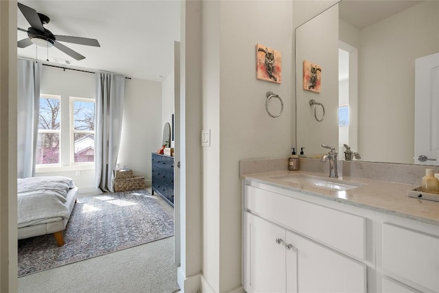 bathroom with vanity and a ceiling fan