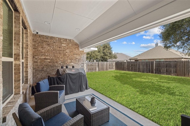 view of patio featuring grilling area and a fenced backyard