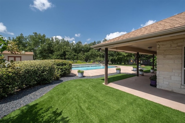 194 Brushy Creek Trl, Hutto, TX 78634 - outdoor pool with a patio and a yard
