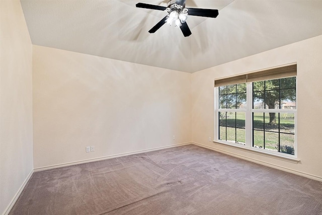 194 Brushy Creek Trl, Hutto, TX 78634 - spare room with carpet flooring, baseboards, lofted ceiling, and a ceiling fan